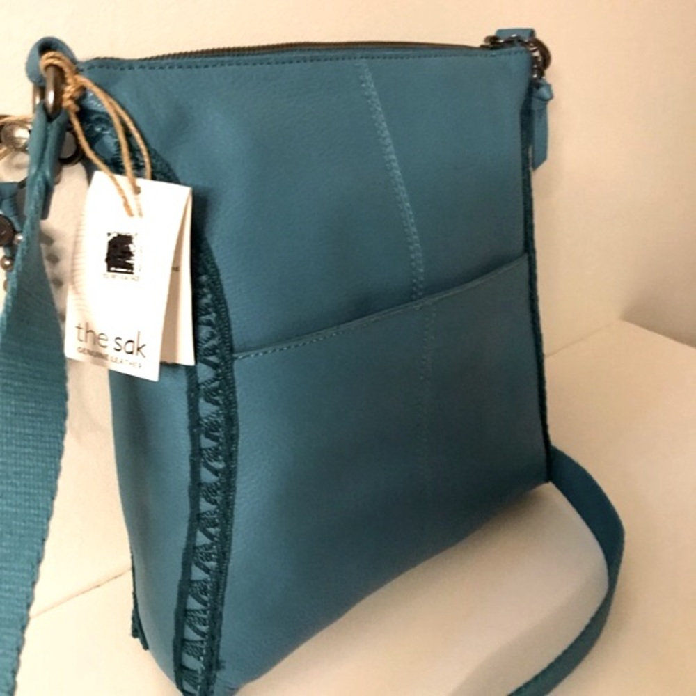 The Sak LUCIA Aquamarine Green Leather Crochet Lined Messenger Charm Handbag